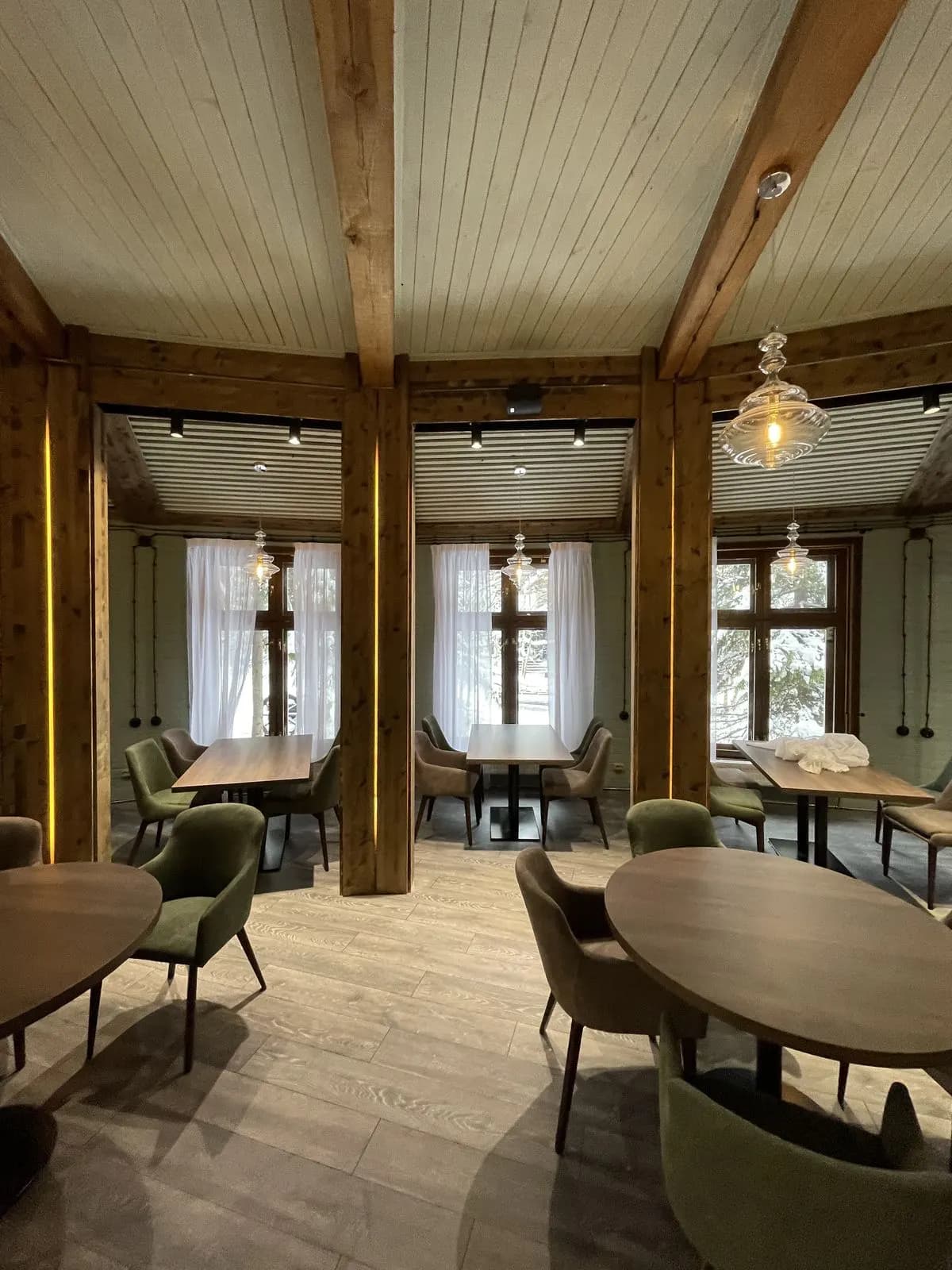 Restaurant dining corner beneath original timber beams
